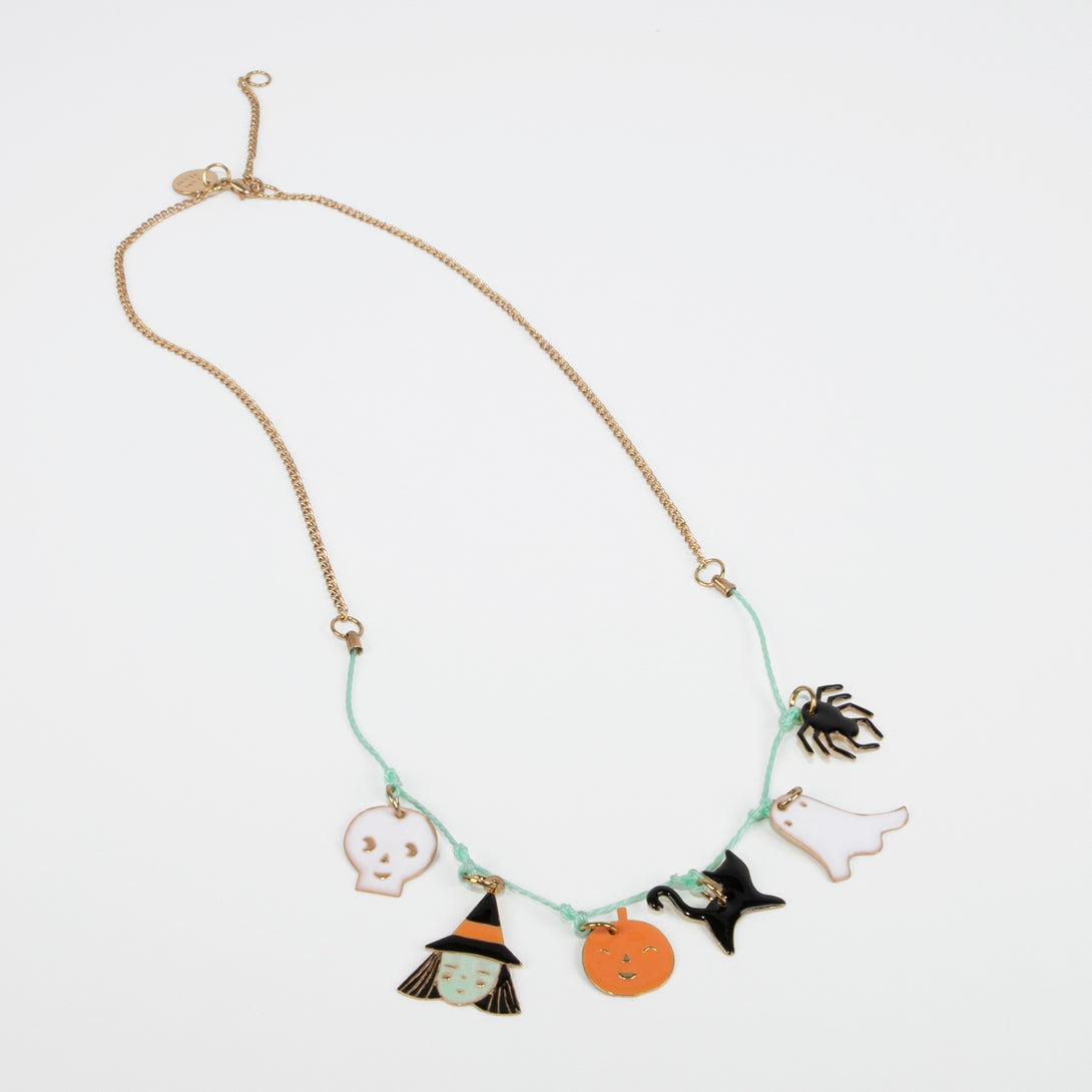 This fabulous Halloween necklace features Halloween charms.