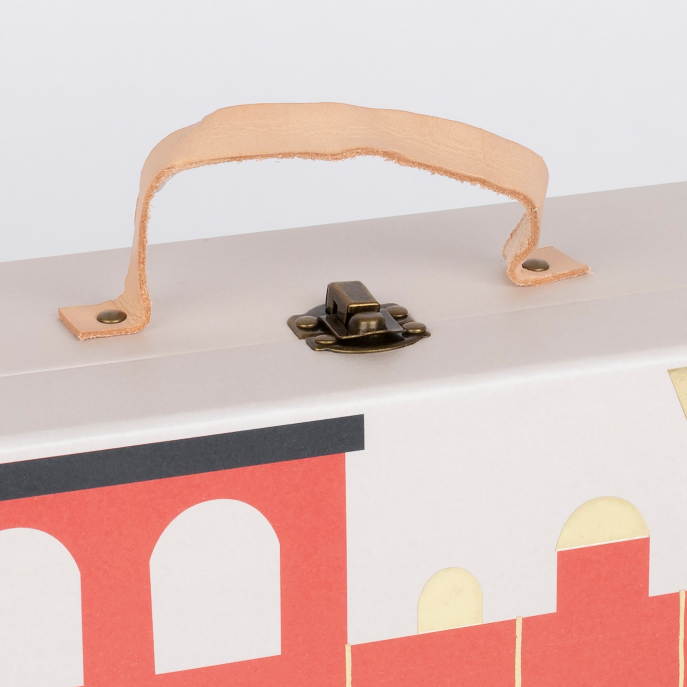 This kids advent calendar is presented in a mini suitcase which contains wooden trains.