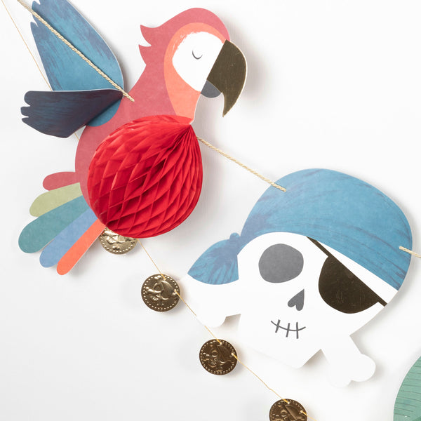 Our party garland is perfect for a pirate birthday party as it features pirate decorations including skull-and-crossbones and a pirate ship. Image3