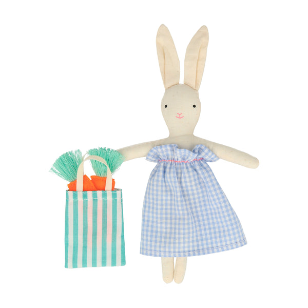 The bunny case opens to reveal an adorable mini bunny doll, with a striped tote bag and felt carrots. Image6