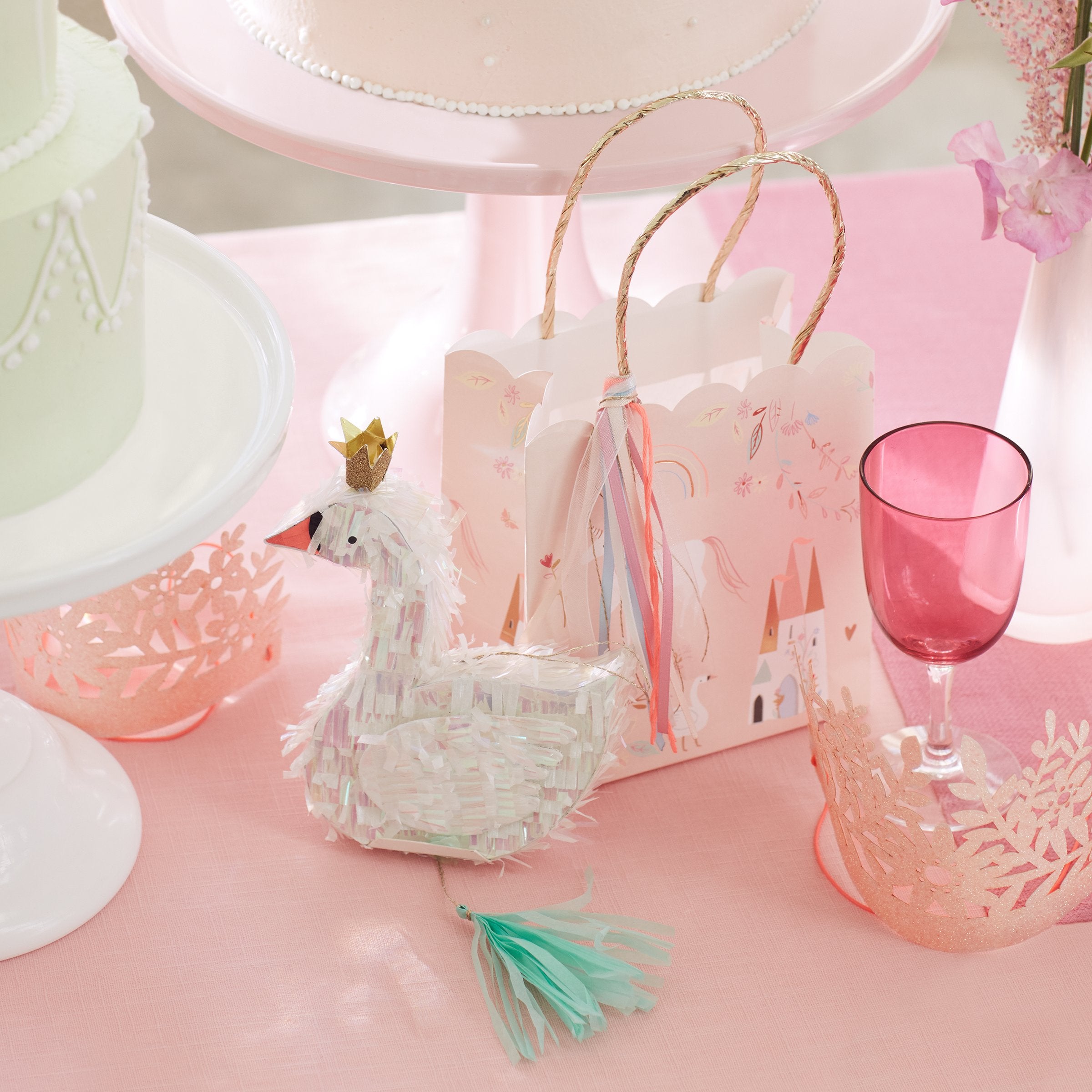 These beautiful party bags feature unicorns, swans and castles, with a scalloped edge and gold foil detail.