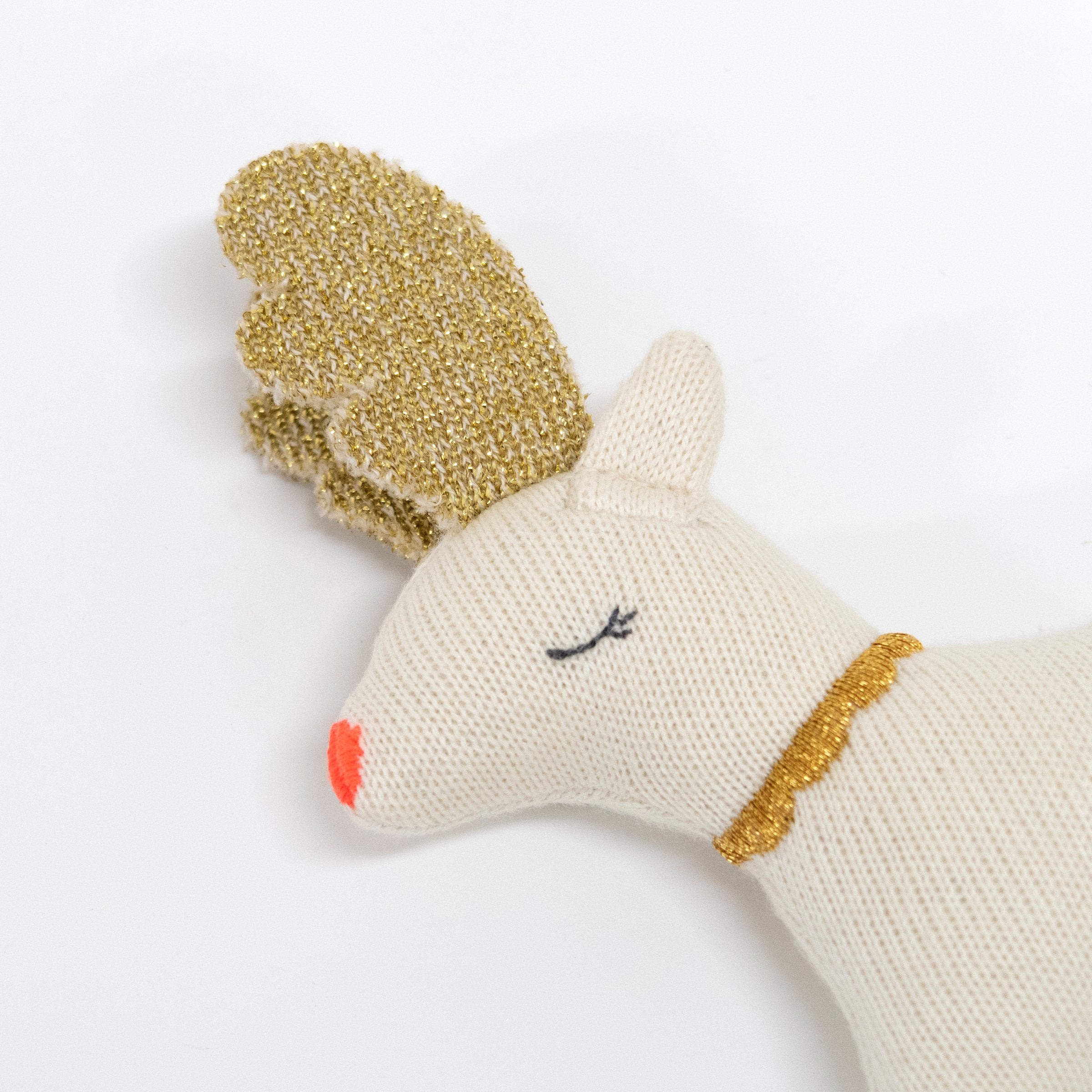 This adorable knitted organic cotton reindeer rattle is a fabulous Christmas baby gift.