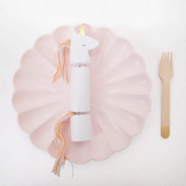 These unicorn party crackers have crystal glitter and gold foil detail, with a yarn tassel mane and tail. Image4