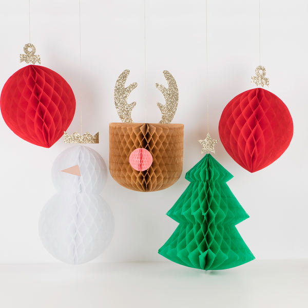 This set includes a reindeer decoration, snowman decoration, a Christmas tree and bauble.