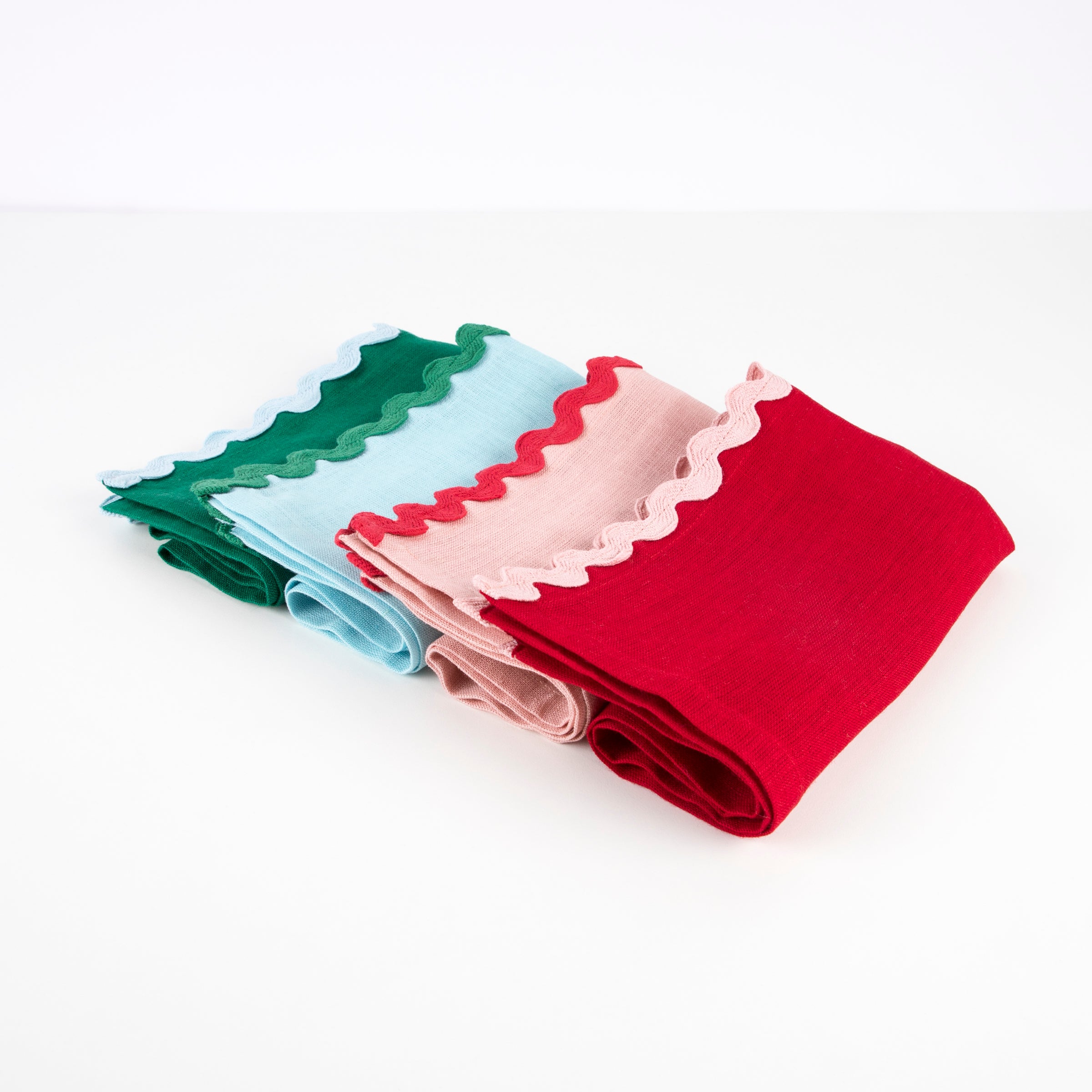 Our green, pink and red fabric napkins, with ric rac details, are perfect for Christmas tableware.