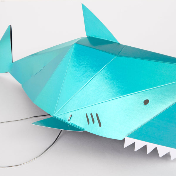 Our hats in the shape of a shark make spectacular paper party hats. Image4