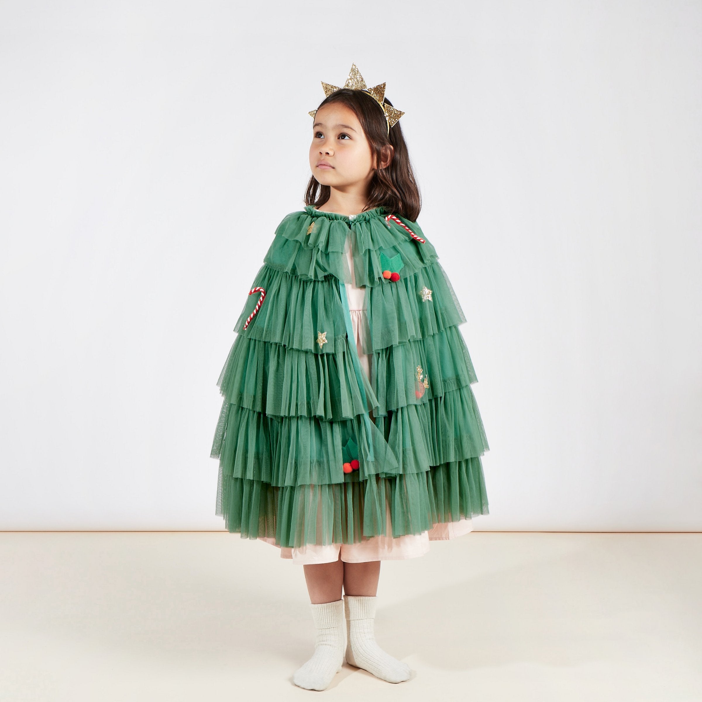 This gorgeous Christmas tree costume is made from tulle with delightful Christmas embellishments