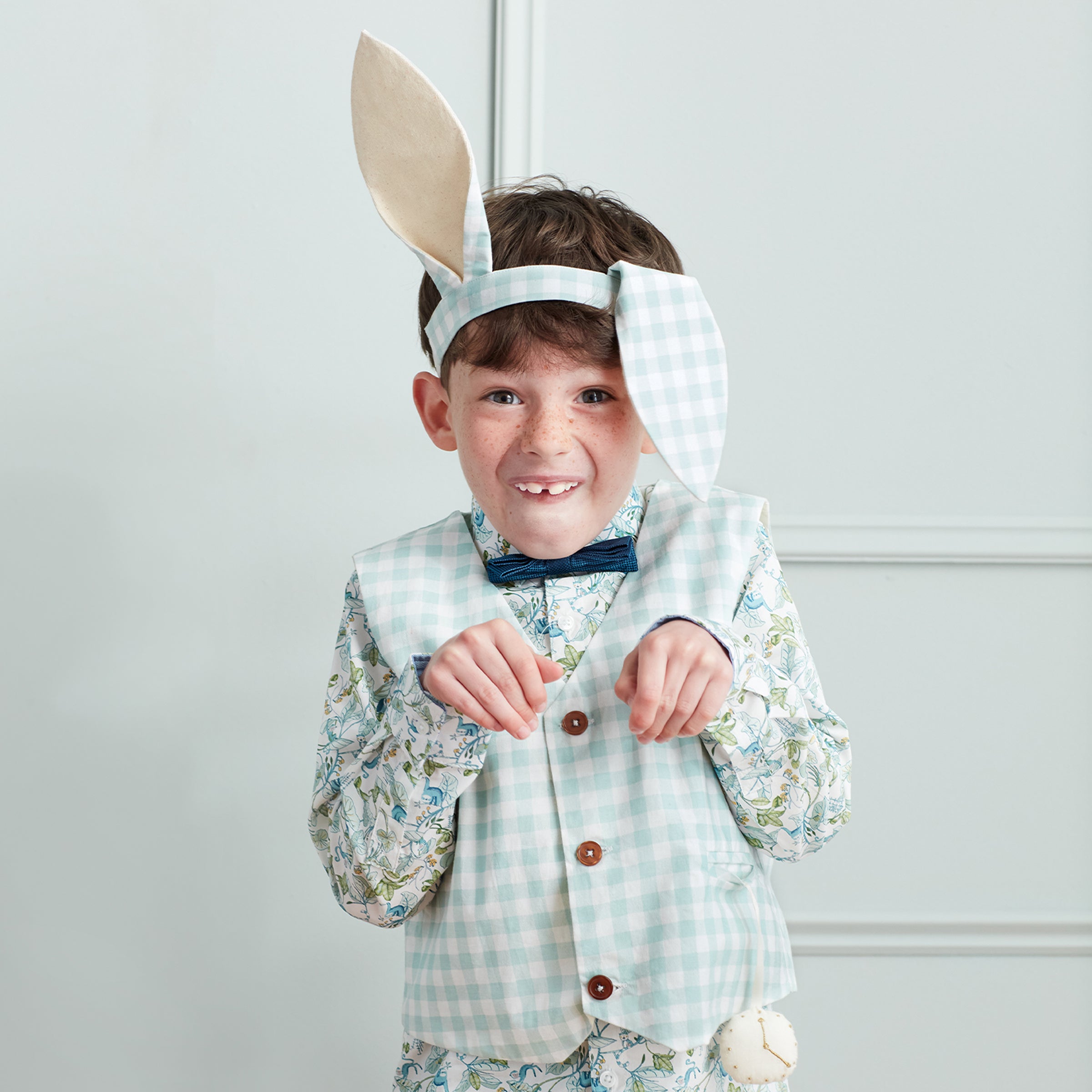 Our Easter outfit of bunny ears and a gingham waistcoat with pompom tail is gorgeous.