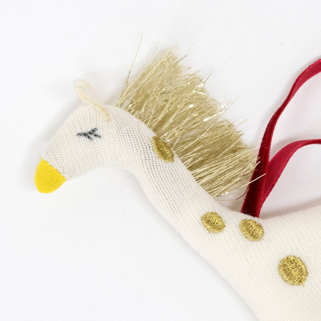 Our giraffe kids' Christmas decoration makes an excellent stocking filler.