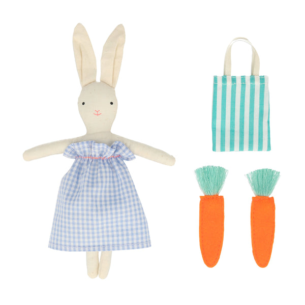 The bunny case opens to reveal an adorable mini bunny doll, with a striped tote bag and felt carrots. Image4