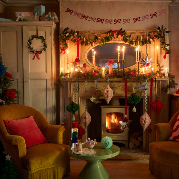 Our hanging Christmas decorations feature shiny silver foil, honeycombed paper and luxury ribbons. Image2