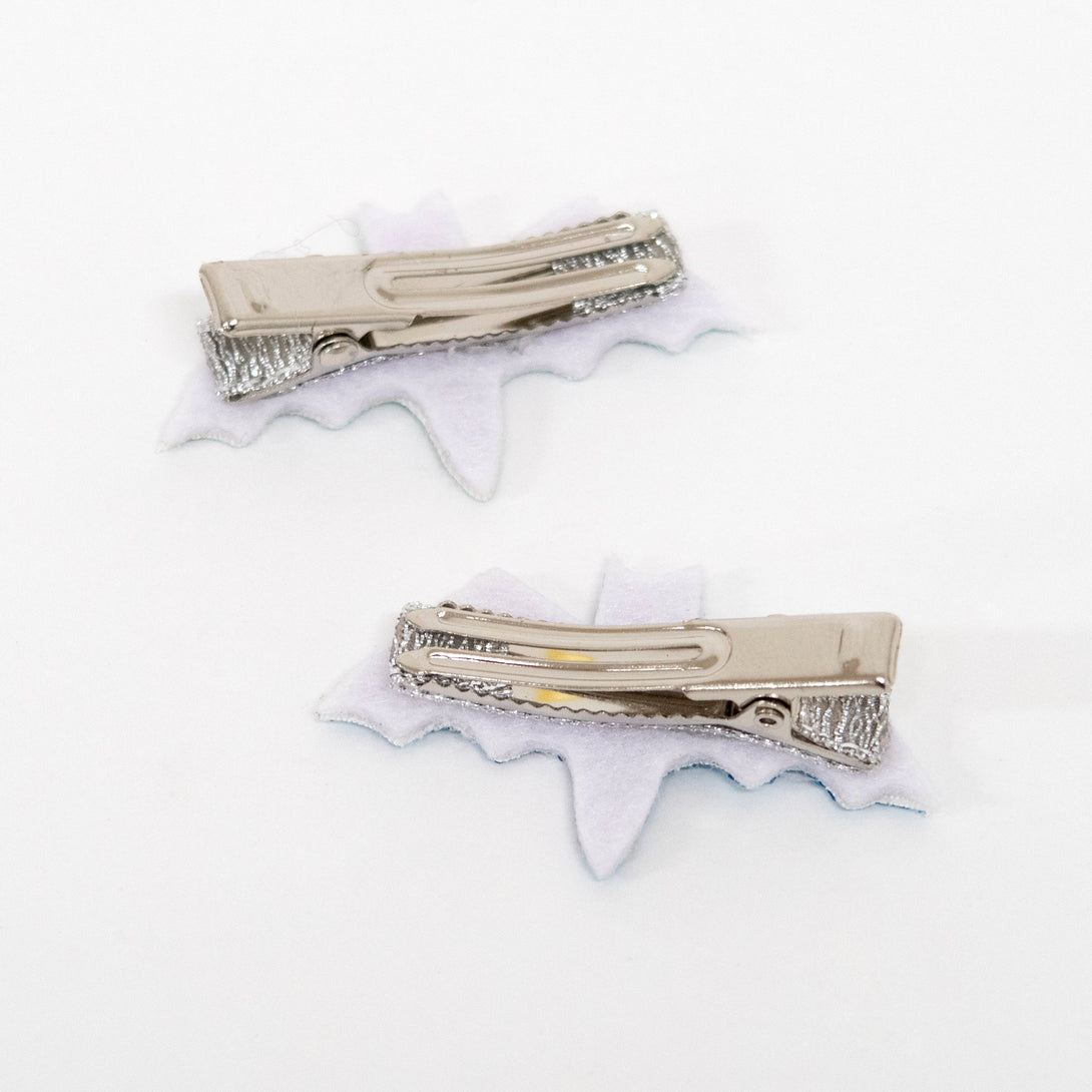 Our terrific Halloween hair clips feature bats crafted from glitter, leatherette and suedette.