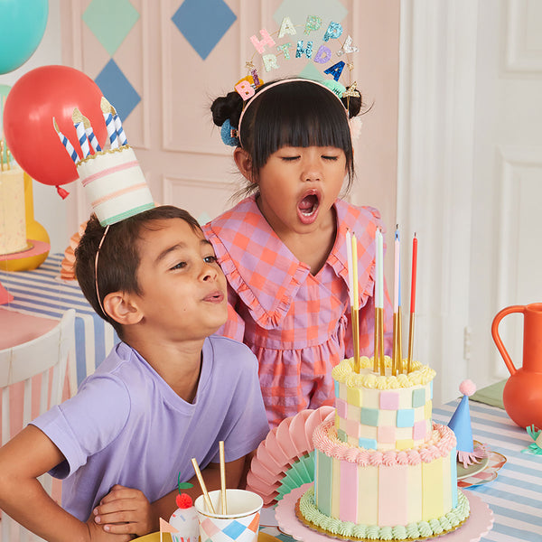 These gold candles are teamed with a rainbow of colors, ideal for a pride cake or birthday cake decorations. Image2