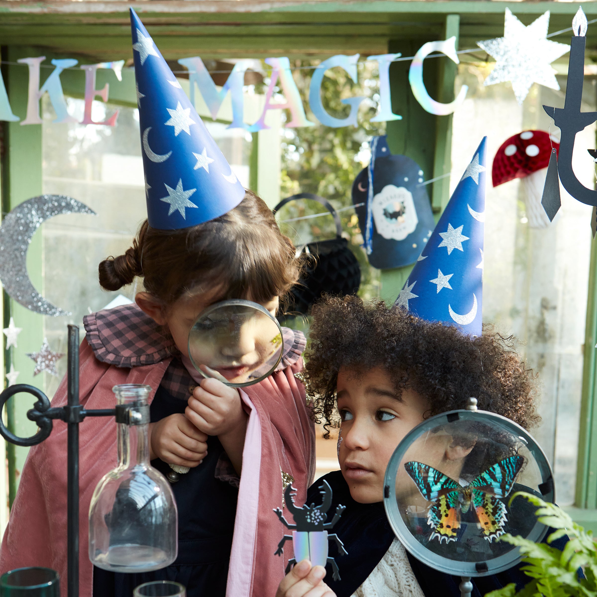 Our blue party hats, in the shape of a wizards hat, match perfectly with our wizard wands.