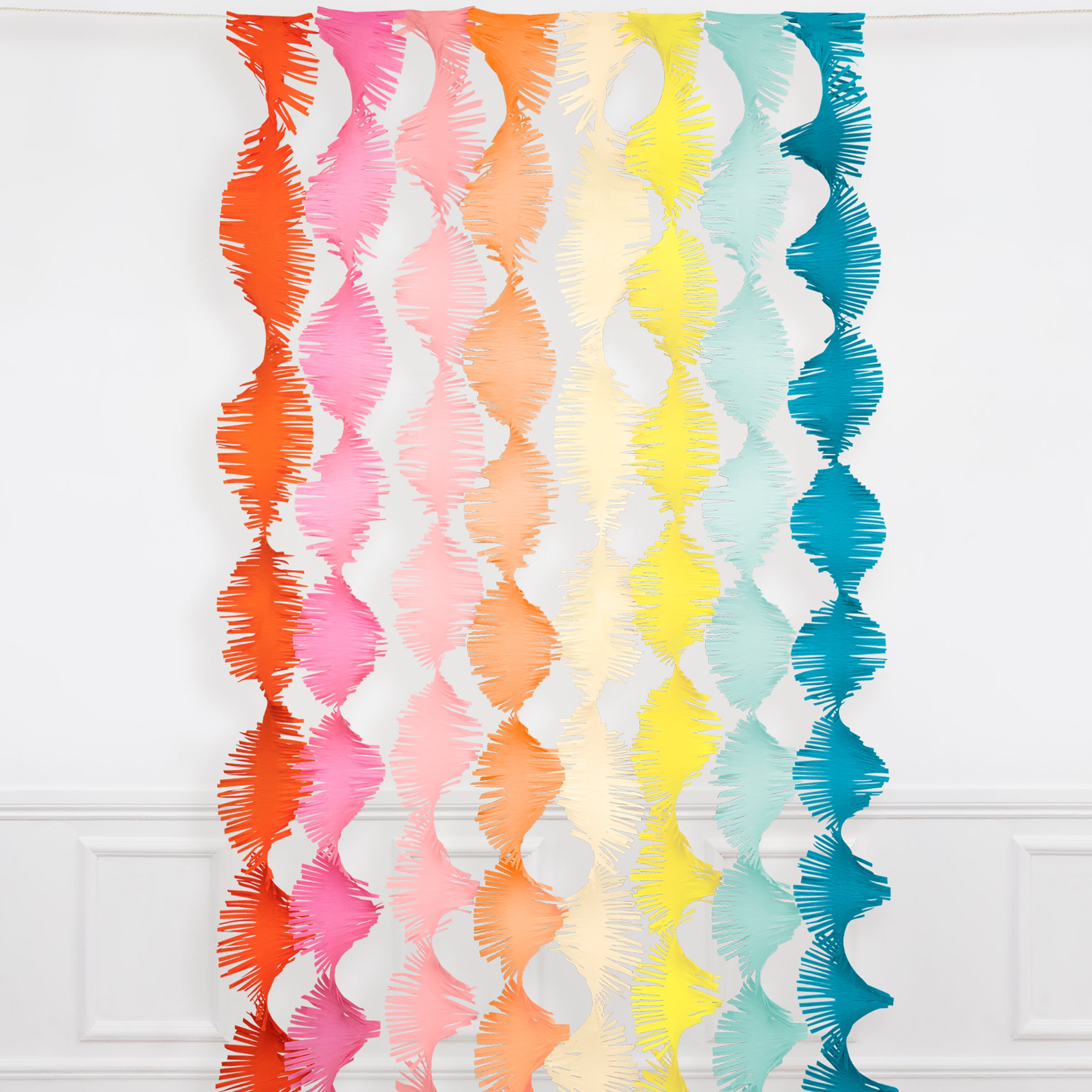 Our party backdrop is crafted from paper streamers in 8 colors.