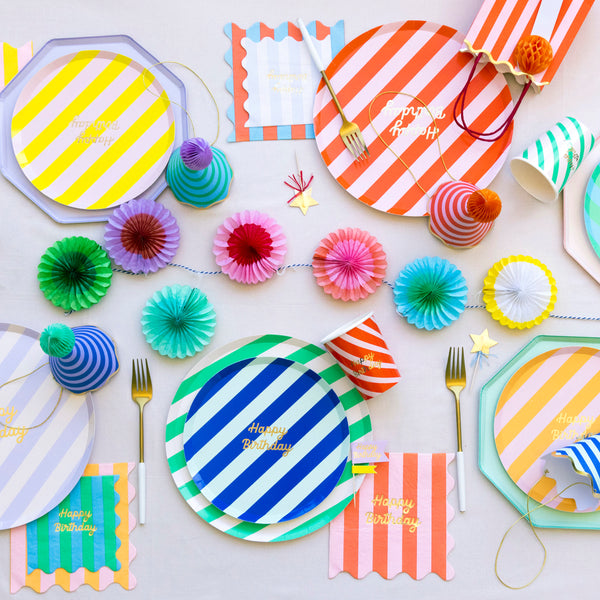Our bright stripes party set has everything you need in a birthday supply set, with tableware, a cupcake kit, party hats and a mini garland. Image2