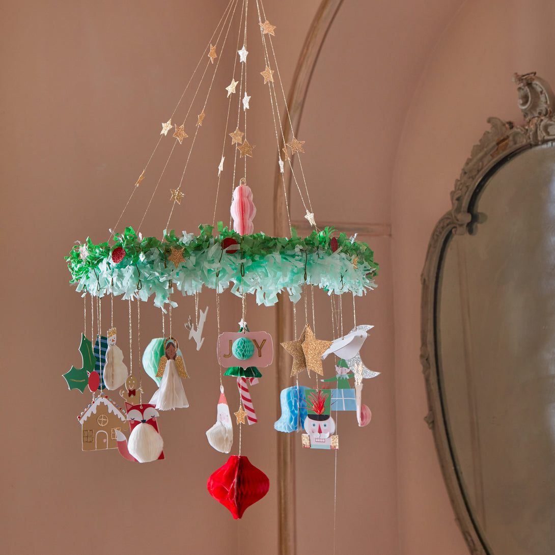 Our Christmas chandelier makes the perfect Christmas hanging decoration, it includes classic Christmas characters and lots of glitter!