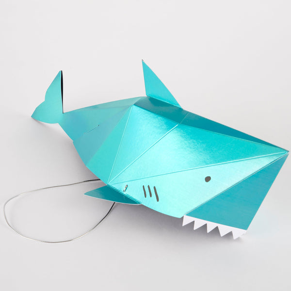 Our hats in the shape of a shark make spectacular paper party hats. Image3