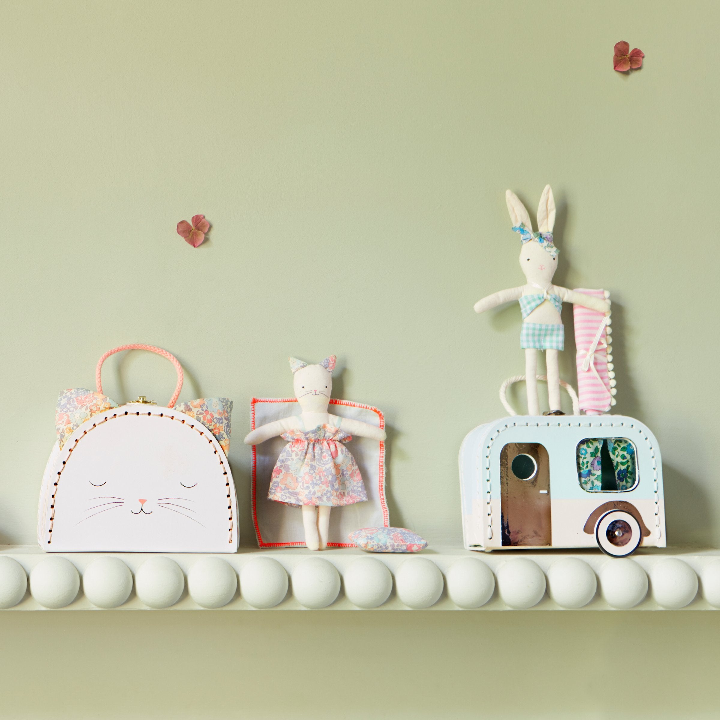 If you're looking for travel toys you'll love our mini suitcase, shaped like a caravan, with a mini bunny doll and accessories inside.
