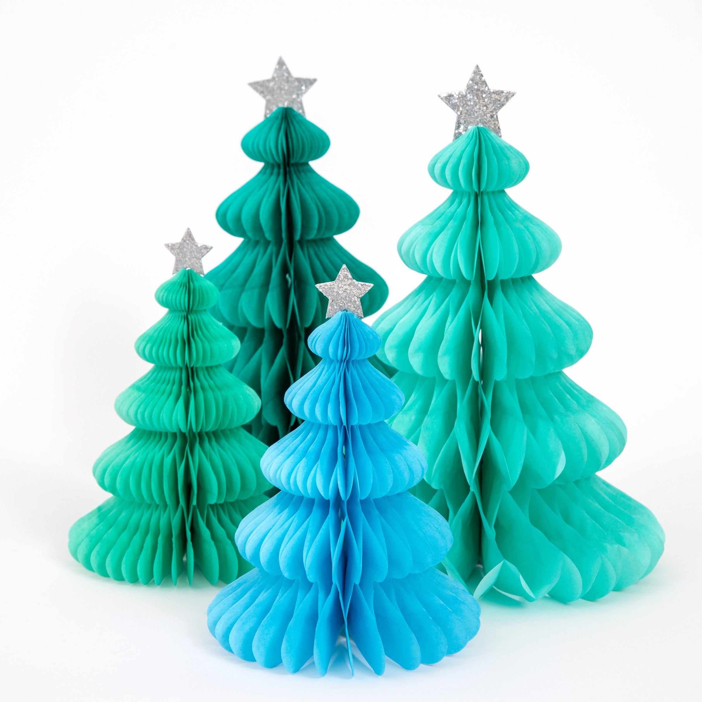 These beautiful honeycomb decorations are made from tissue paper with shining silver stars on top.