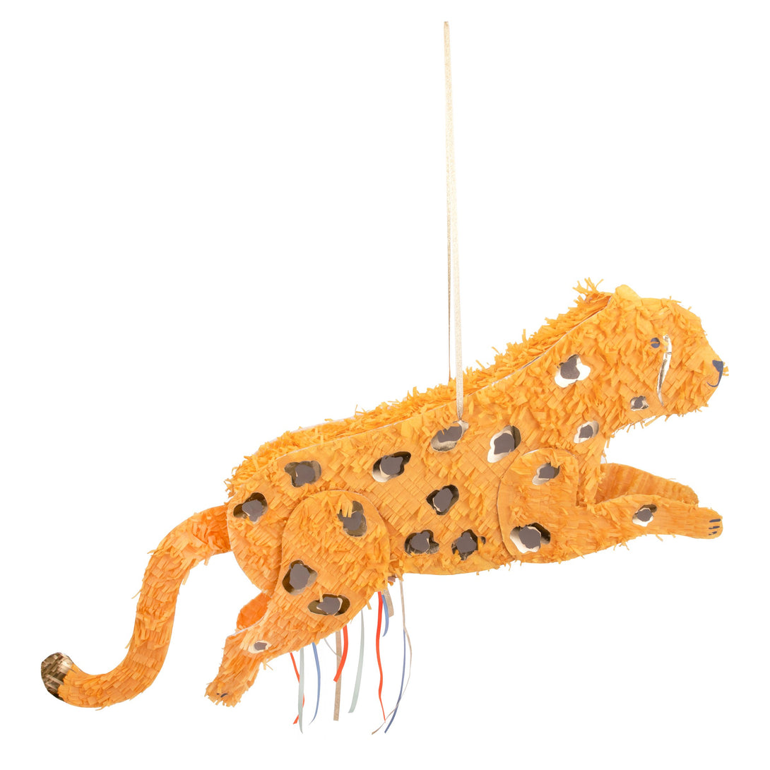 Add fun to your safari party theme with our cheetah piñata crafted with colorful ribbons, ready to fill with your own candy and treats.