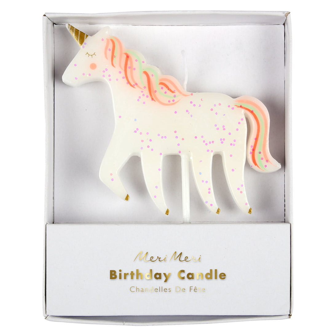 This special unicorn candle has a bright mane and tail, and a shiny gold foil horn and hooves.