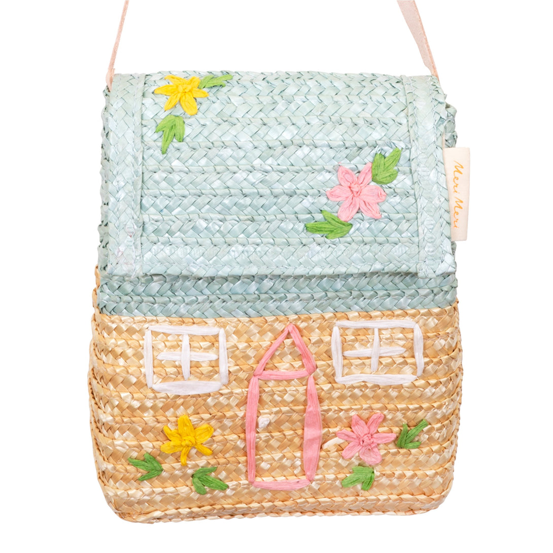 Our kids handbag, crafted from straw, is made to look like a pretty cottage.