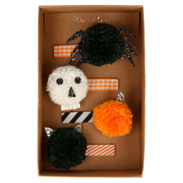 Create the most amazing Halloween hairstyles with these skull, spider, pumpkin and cat pompom clips. Image3
