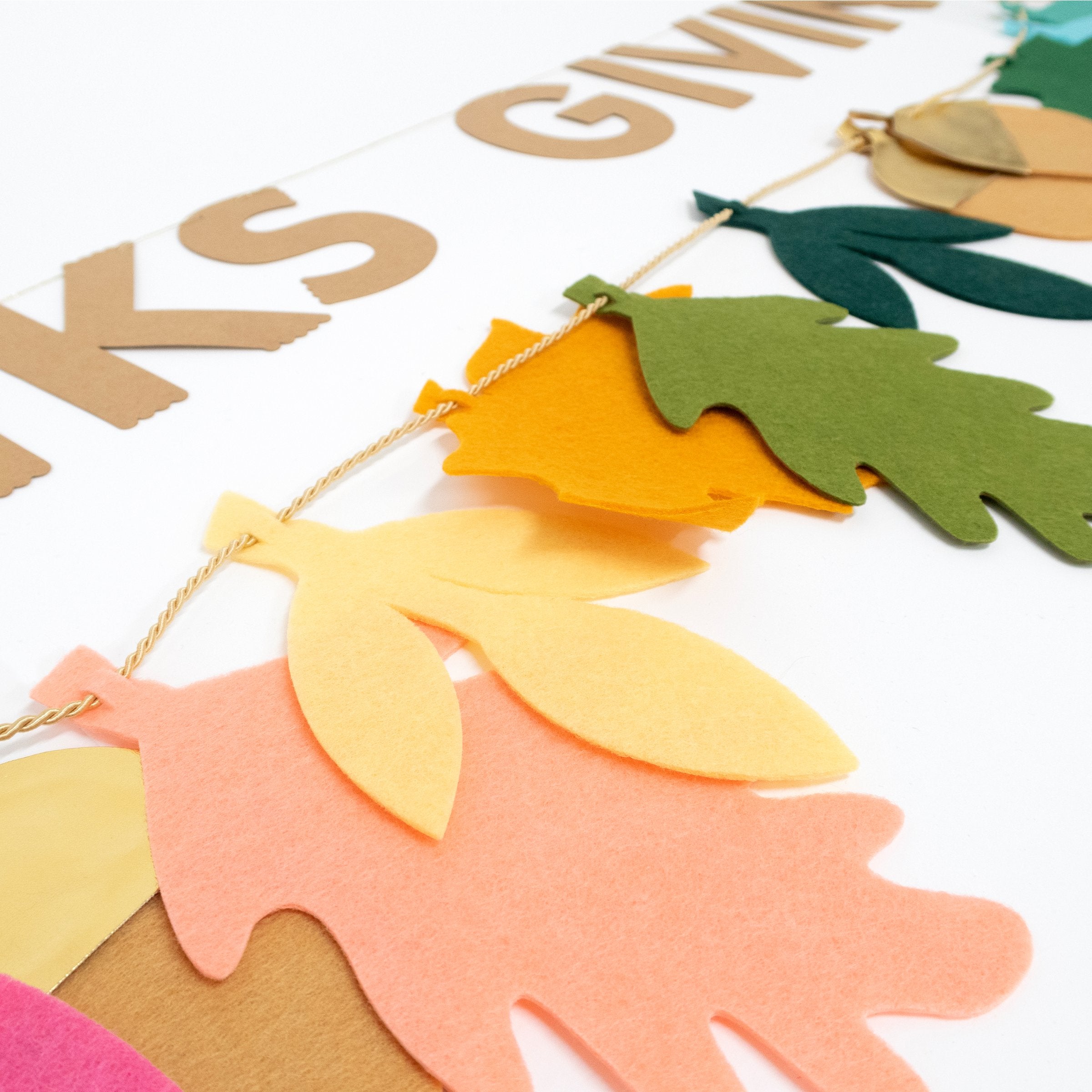 Make your Thanksgiving party look amazing with a felt leaf Thanksgiving garland.