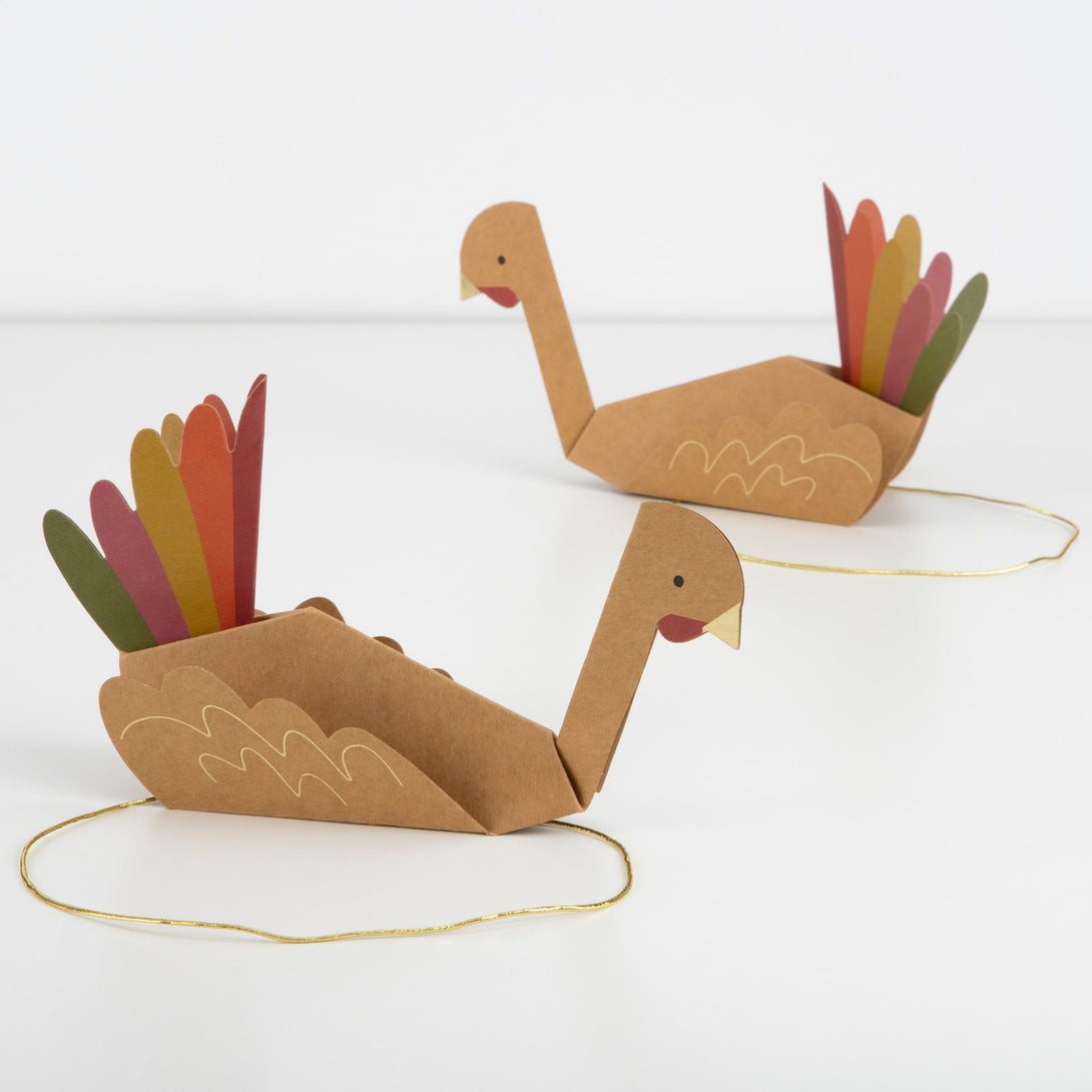 Colorful turkeys, crafted from paper, made the most wonderful Thanksgiving hats.