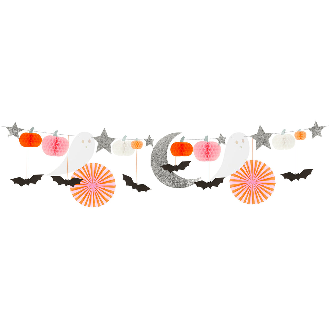 Our pastel garland is the perfect paper garland for a kids Halloween party.