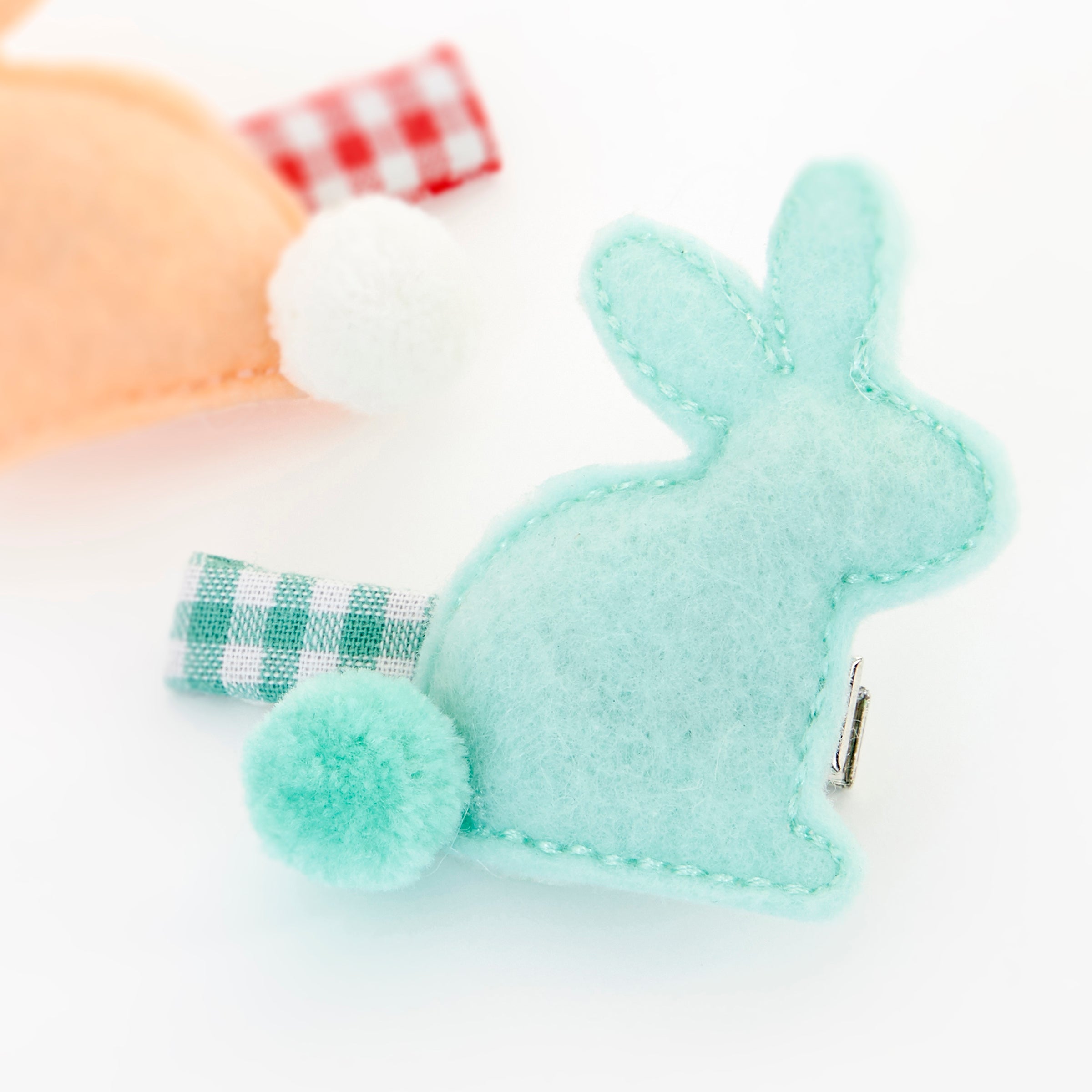 Our hair accessories for kids for Easter are the sweetest little bunnies hair clips, with pompoms and gingham ribbons.