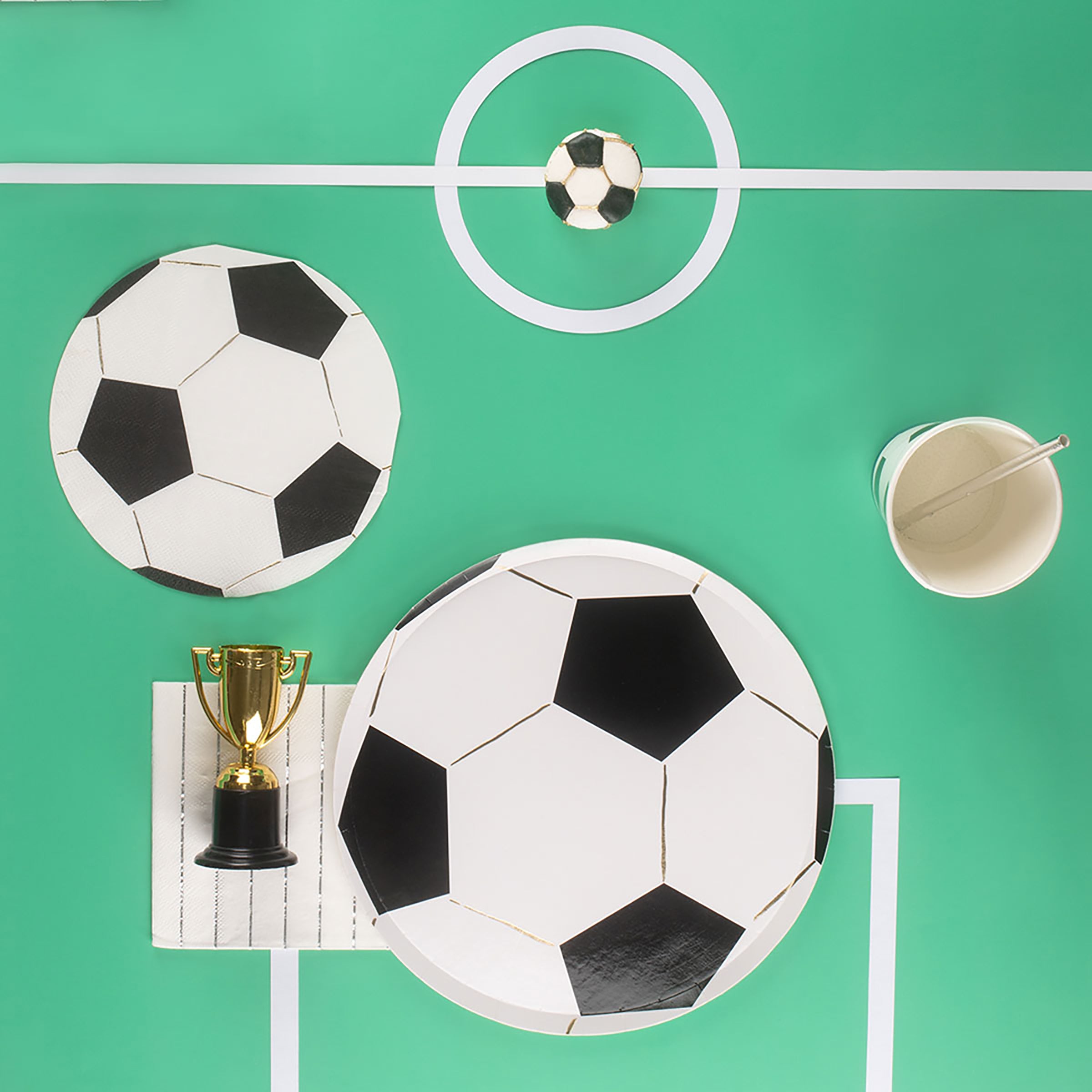 Our paper plates are cut into the shape of a soccer ball with fabulous gold foil details.