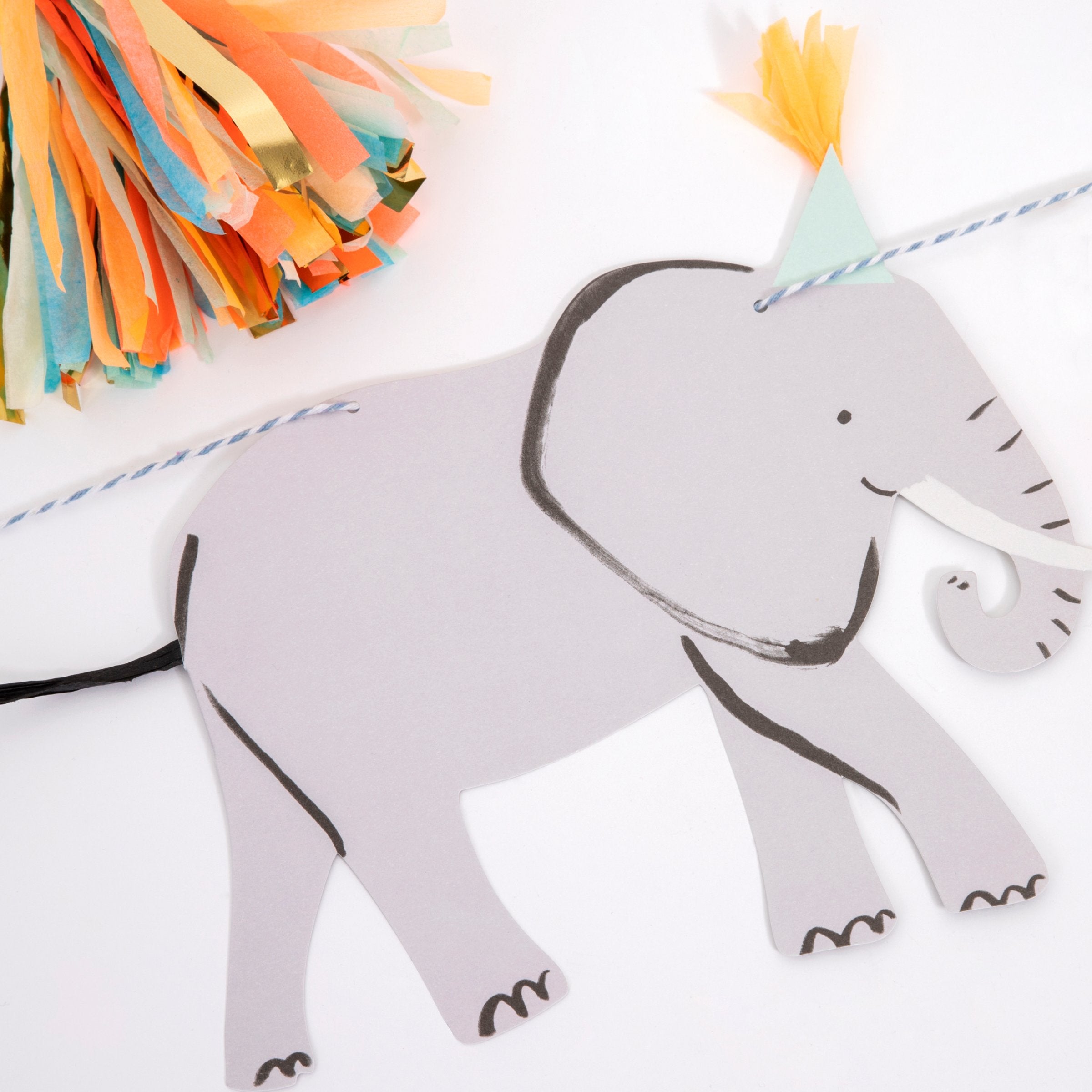 Our birthday garland with safari animals is perfect for a safari theme party.