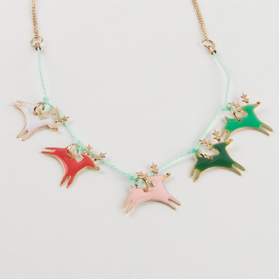 This Christmas necklace, crafted with enamel reindeers, is a wonderful kids stocking filler.