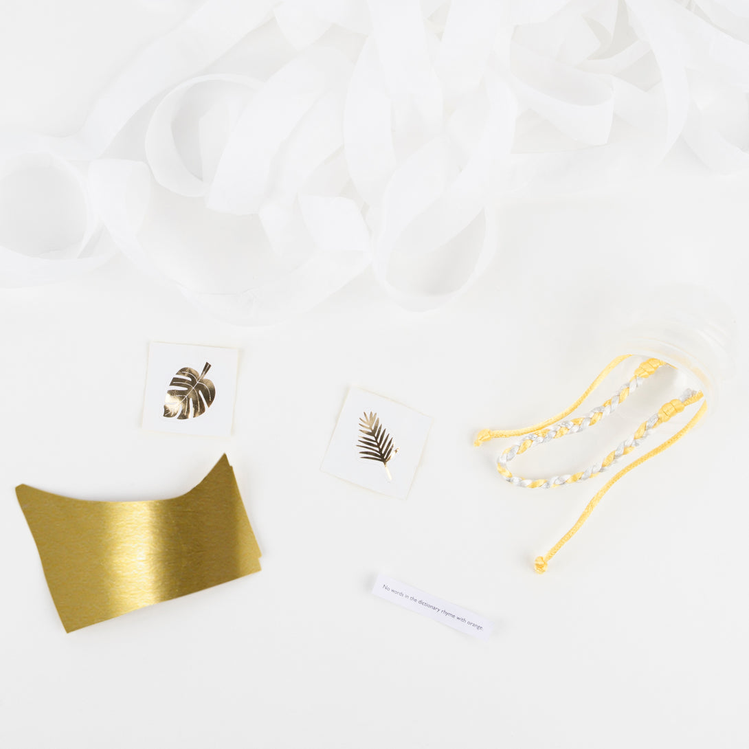 Make your New Years Eve party look stunning with our gold plates, gold napkins, gold cups, party hats, a party garland and surprise balls.