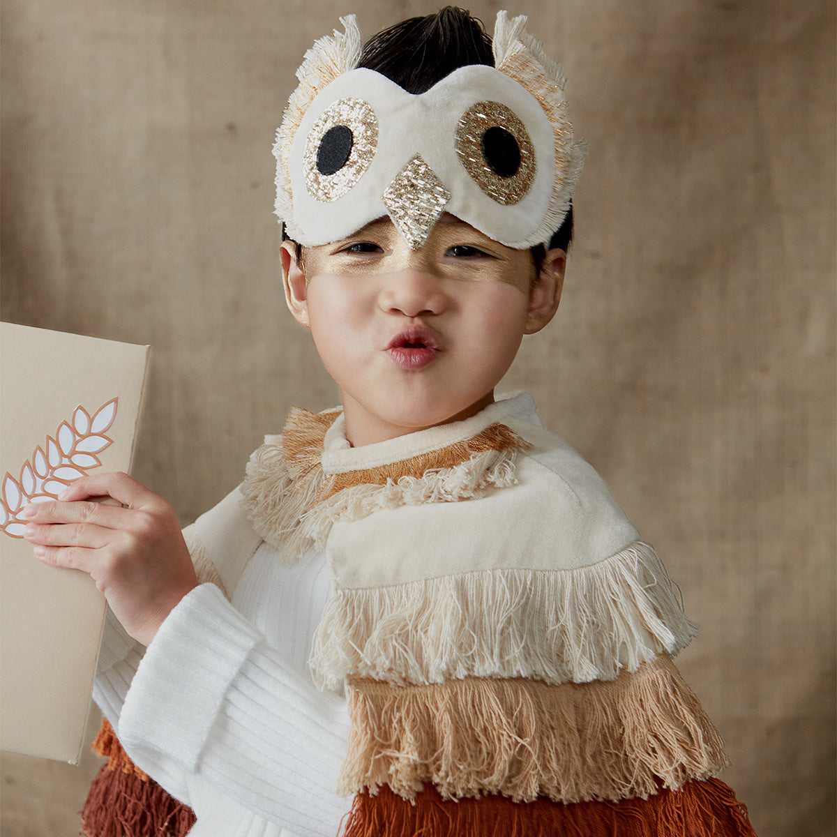 Our owl headdress and owl cape are wonderful to wear as an owl Halloween costume.