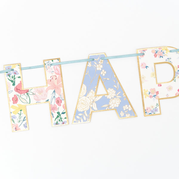 Our party garland spells out the words Happy Birthday with pretty floral designs. Image2