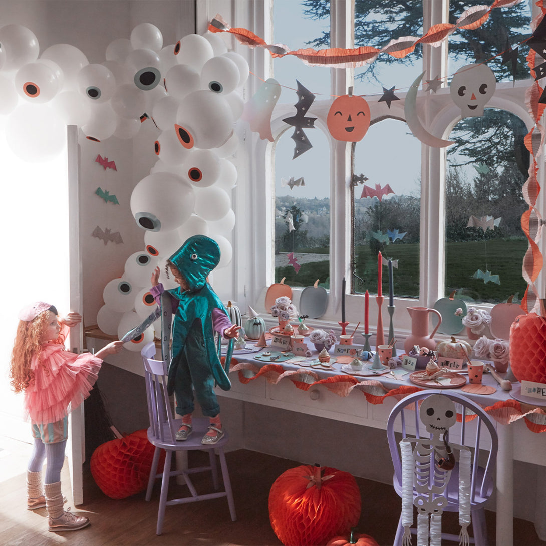 Our pastel party streamers are a stylish way to add color to your Halloween party decorations.