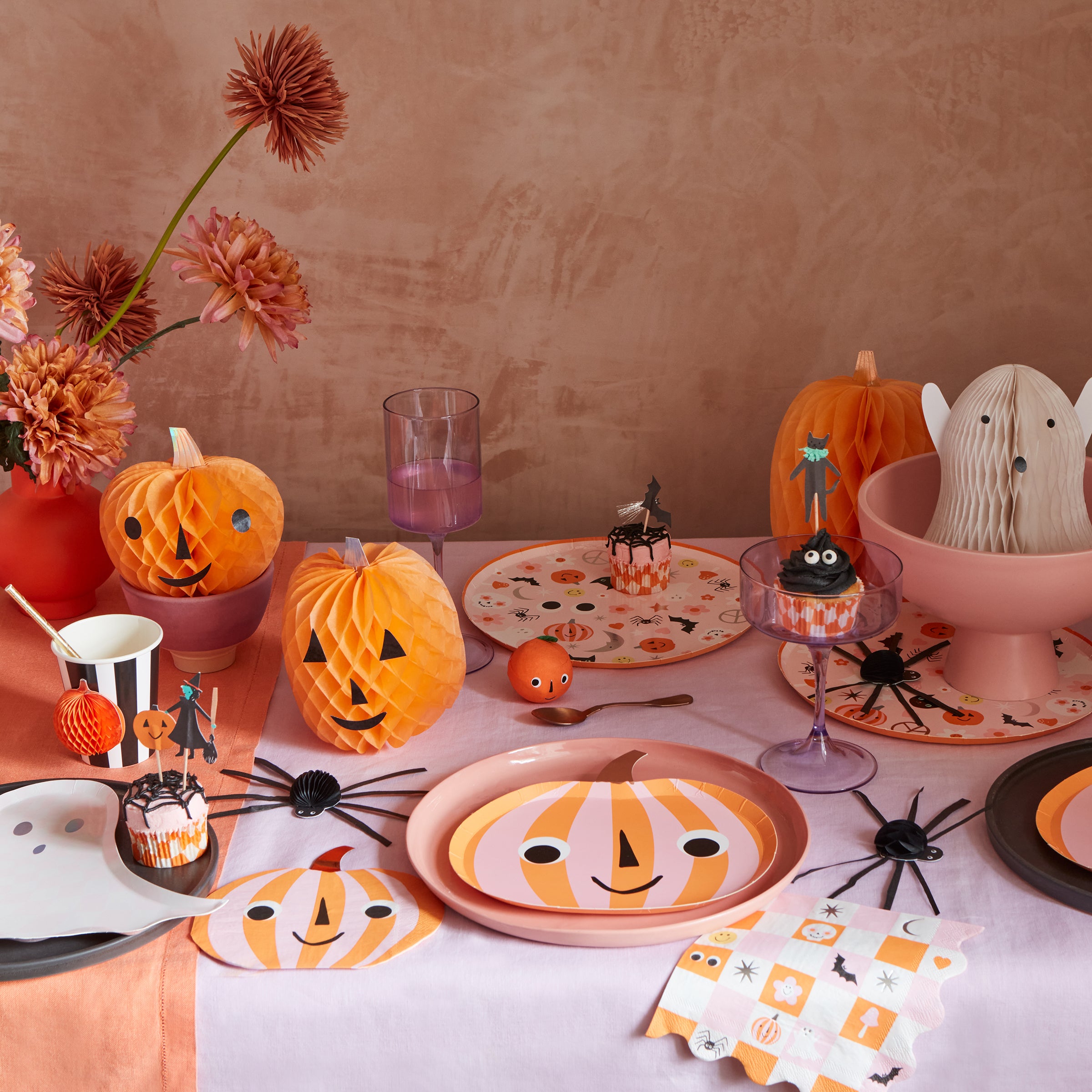 Our colorful paper plates, featuring Halloween icons, are ideal for Halloween party ideas for a really groovy party.
