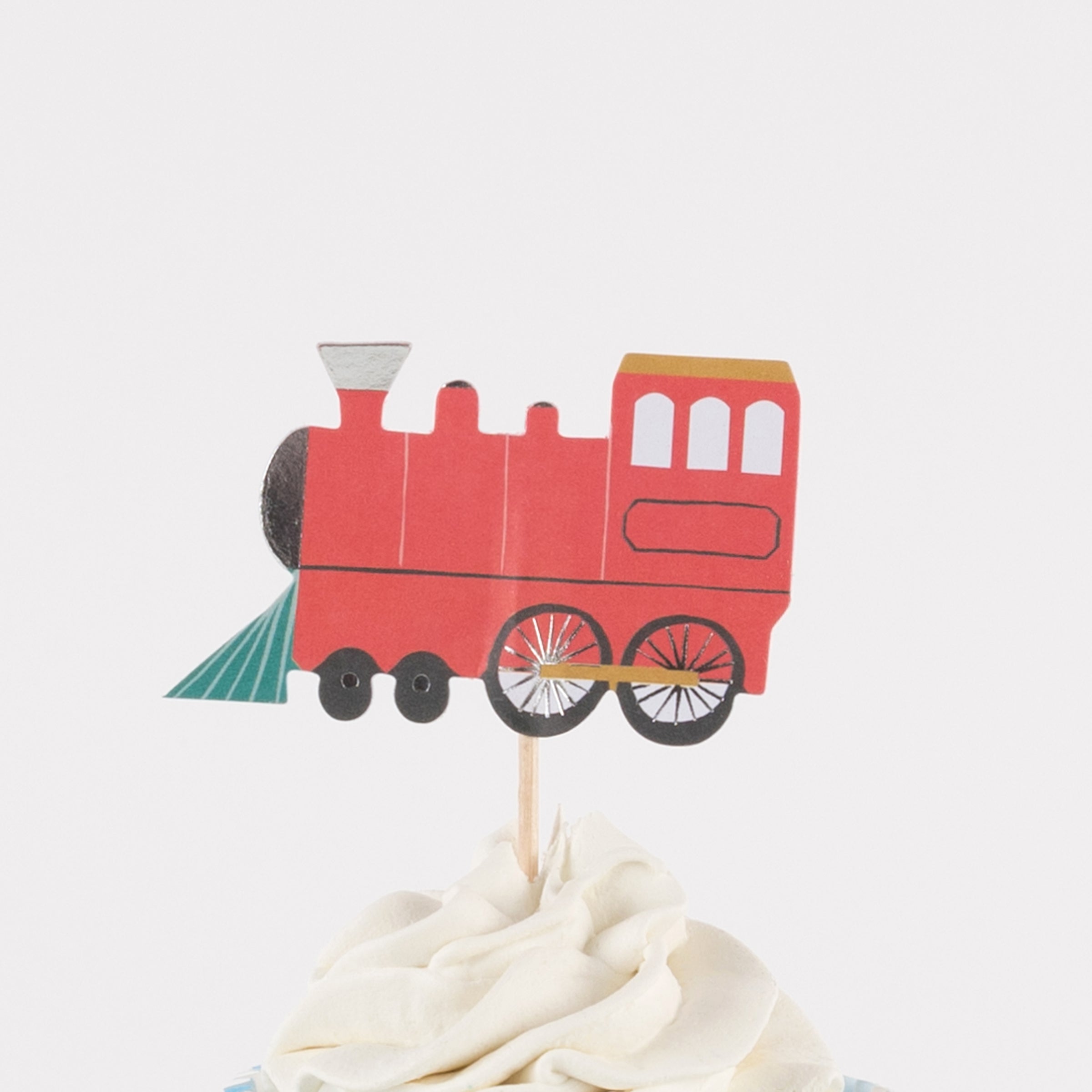 Our special cupcake kit feature train cake toppers and striped blue and teal cupcake cases.