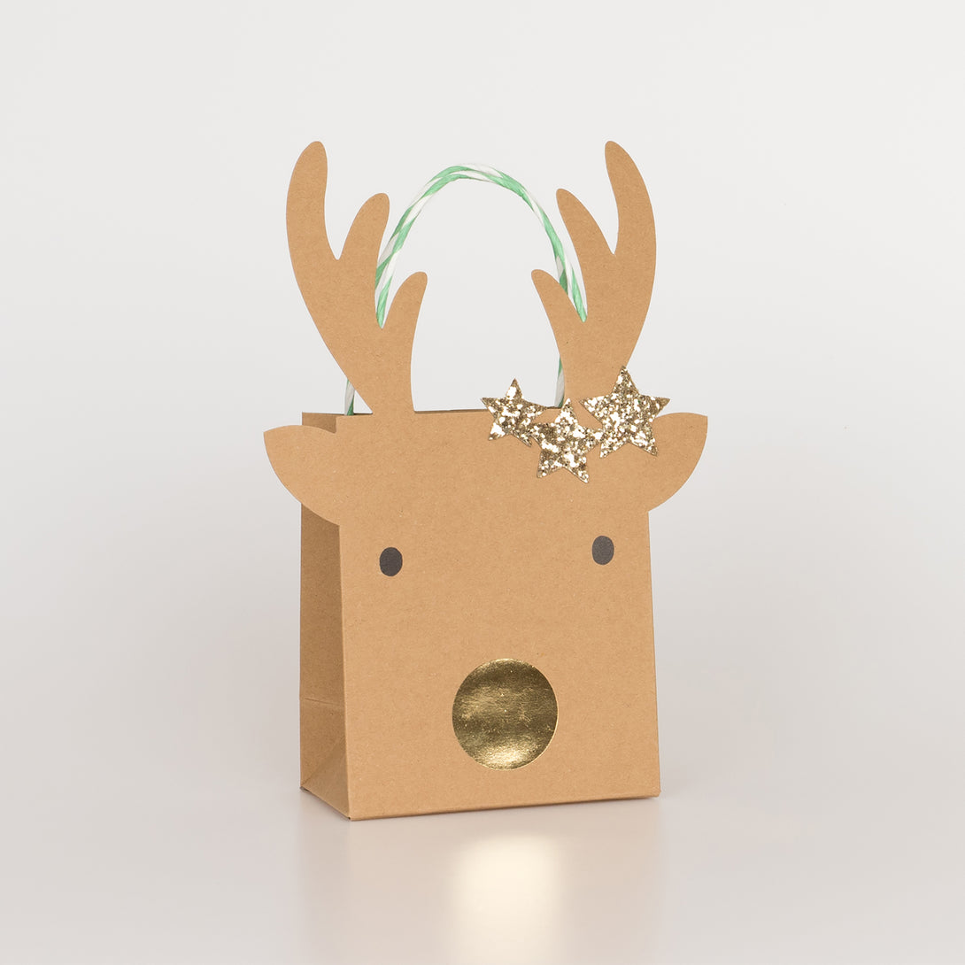 Our Christmas bags for gifts, with reindeer and stars, make luxury paper bags.