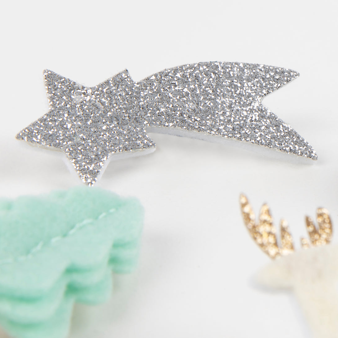 Our Christmas hair clips are crafted from felt and glitter.