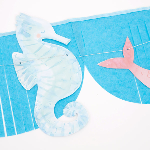 Our mermaid party supplies bundle includes mermaid tableware and a mermaid garland. Image4