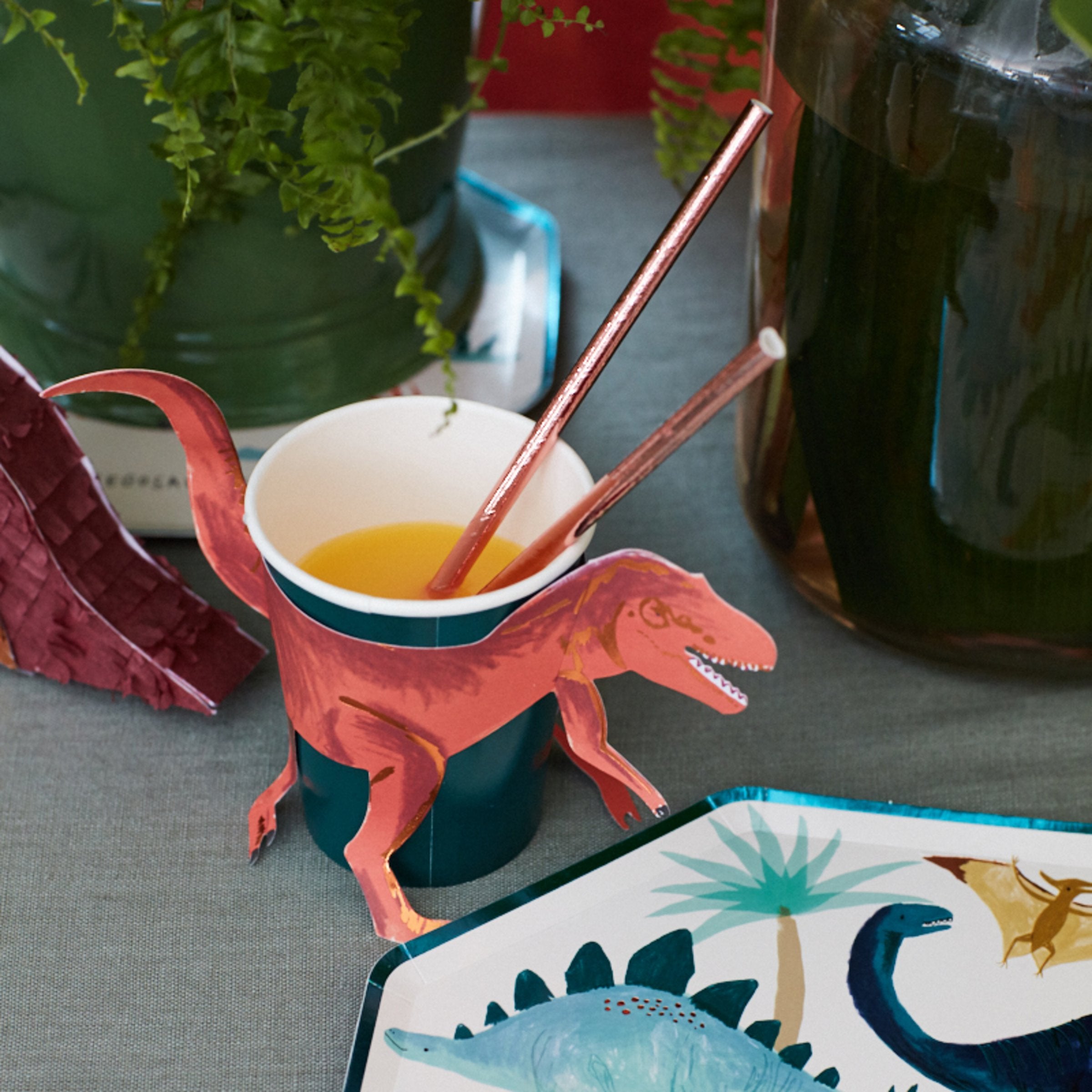 The 3D T-Rex detail on our dinosaur cups make the perfect dinosaur party decorations.
