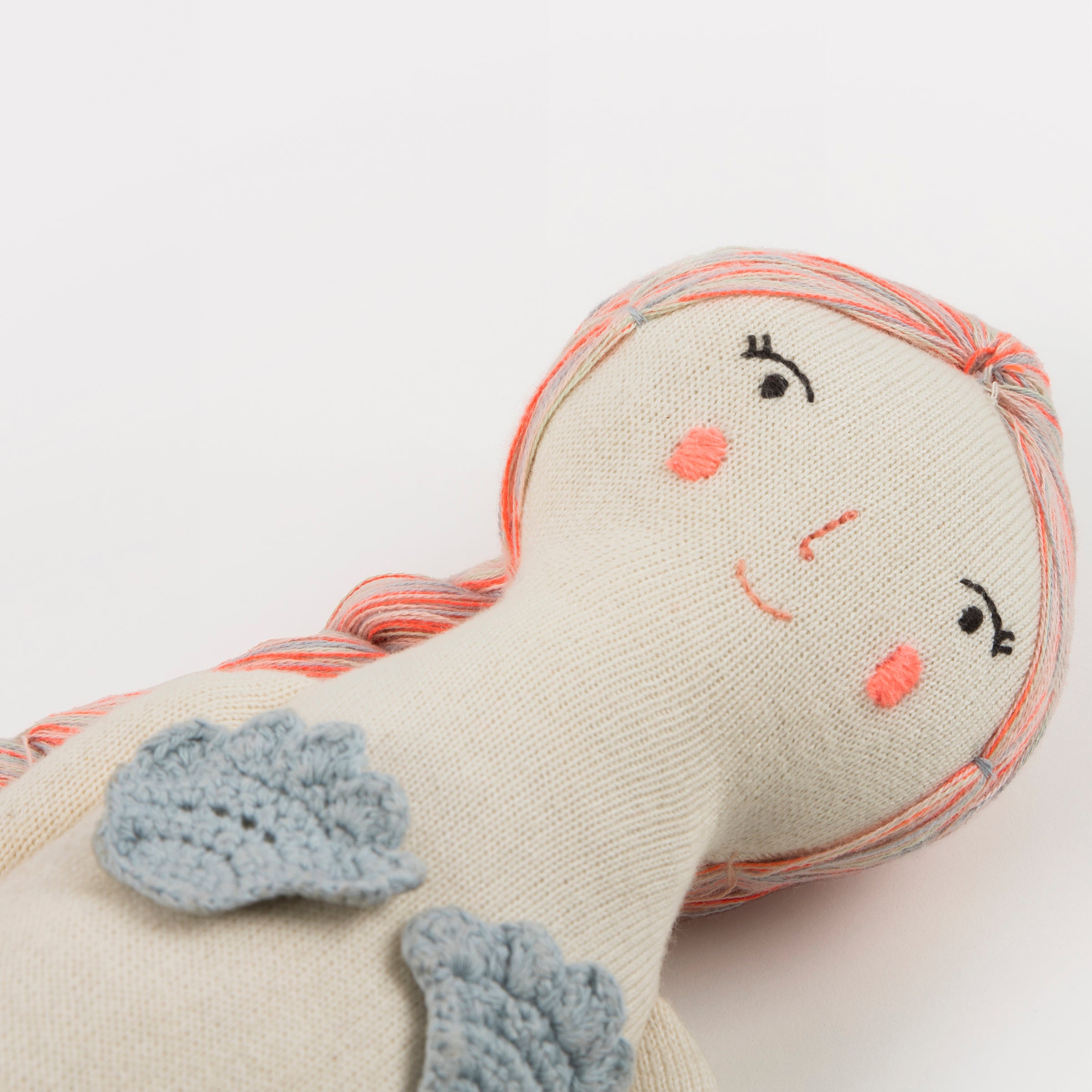 Our mermaid toy is a cotton toy with beautiful embellishments.