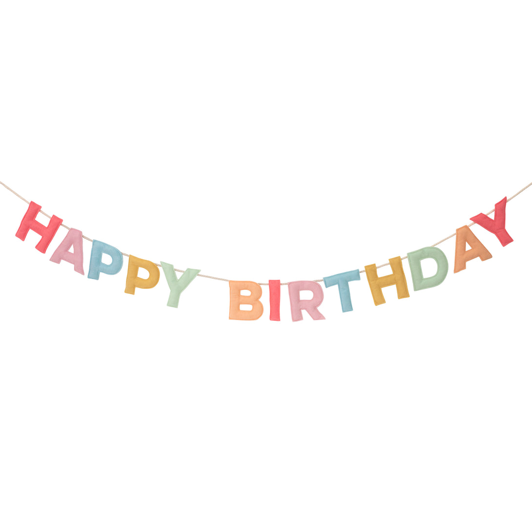 Add a rainbow of color to your birthday party supplies with a colorful felt garland, paper tablecloth and bright birthday cake candles.