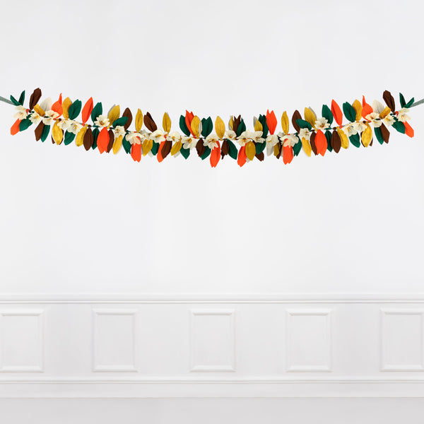 This paper flower garland, with paper leaves, makes a stunning Thanksgiving decoration idea. Image3
