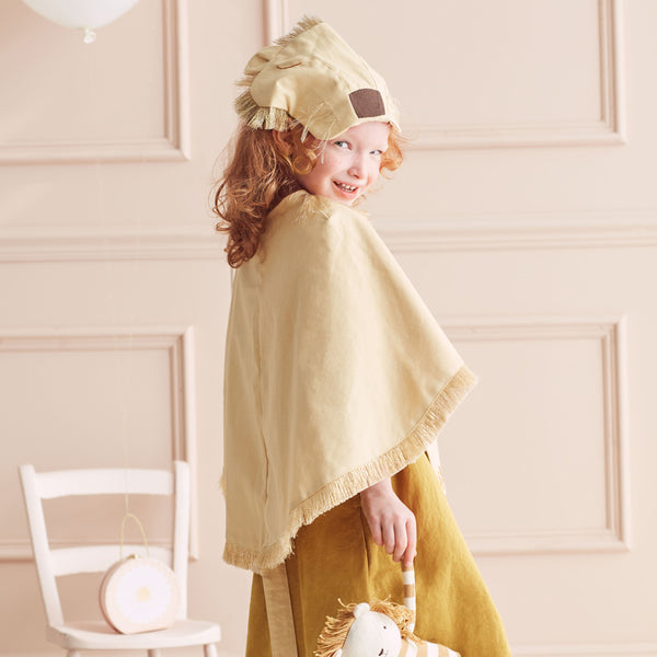 The fabulous kids costume has a cape, lion hat and swishy tail. Image9