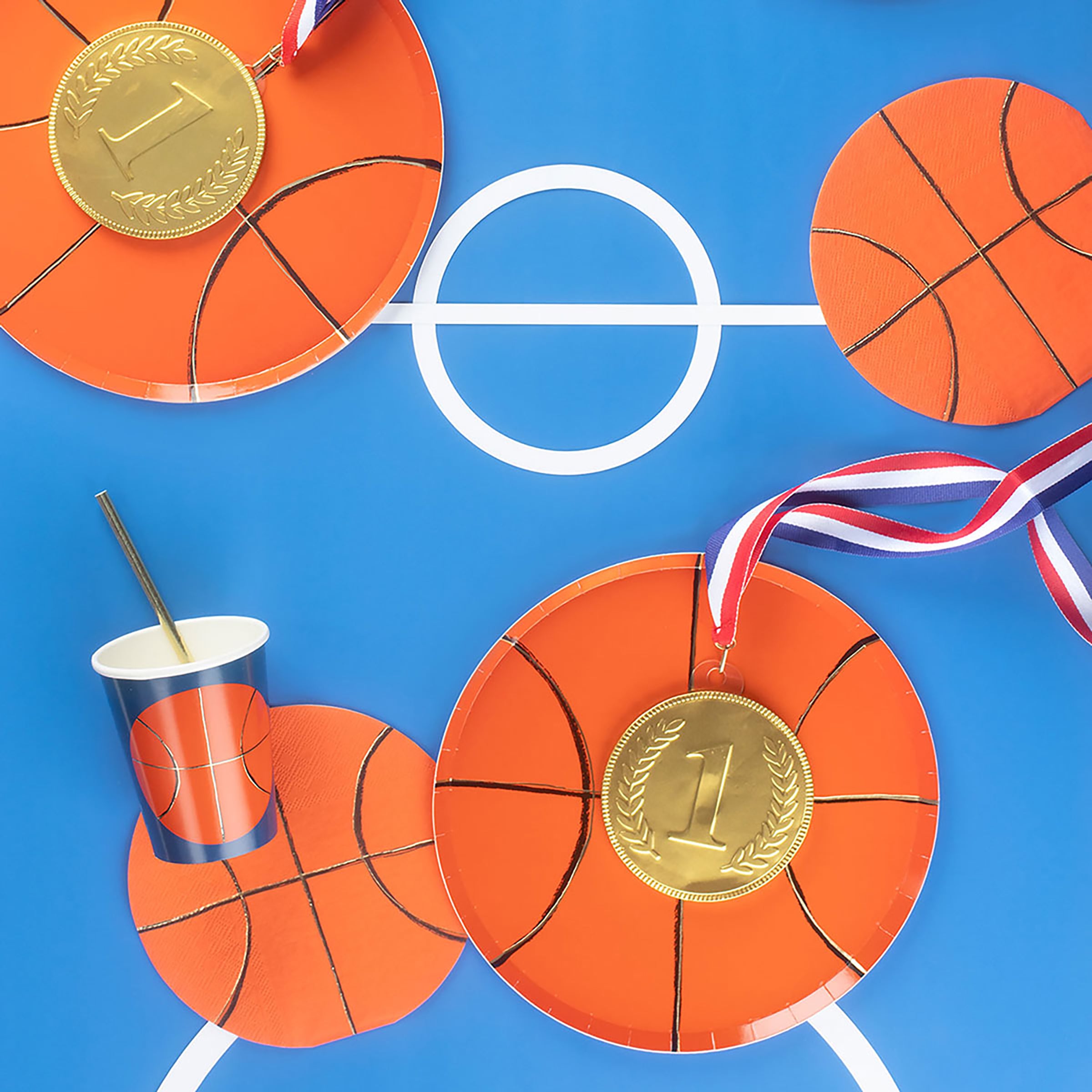 Our party plates, in the shape of a basketball with gold foil details, are perfect for basketball party supplies.